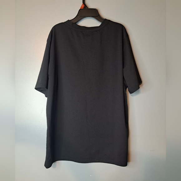 Temu pink t-shirt. Size 1xl 100% polyester - Picture 3 of 3